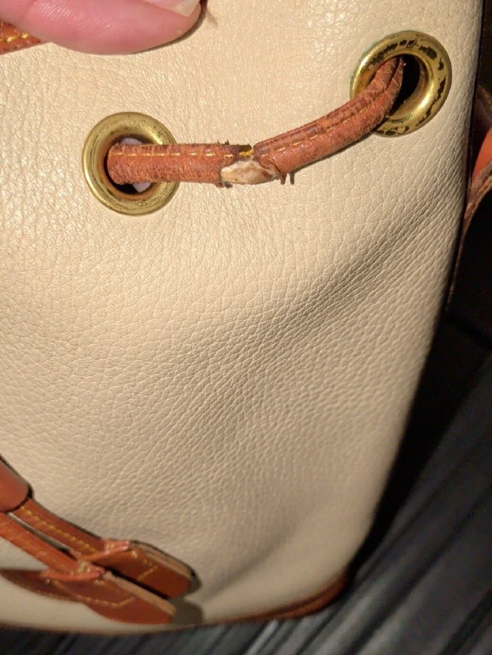 Dooney & Bourke Cream and Brown Drawstring Bucket Bag